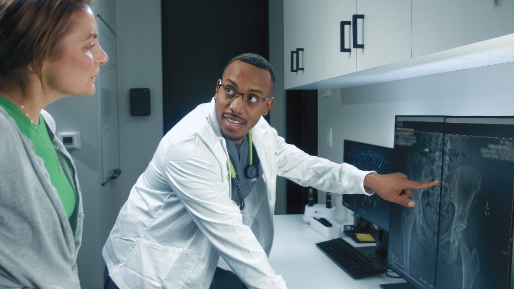 NeuMed provider reviewing imaging with a patient